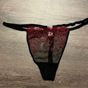 Used Sheer Black Thong with Red Beaded Embroidery size xl